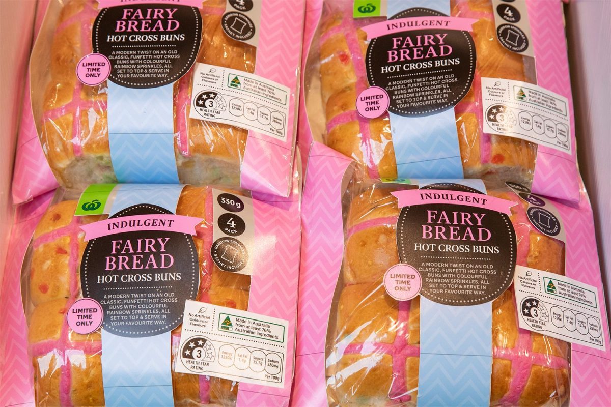 Packets of fairy bread hot cross buns