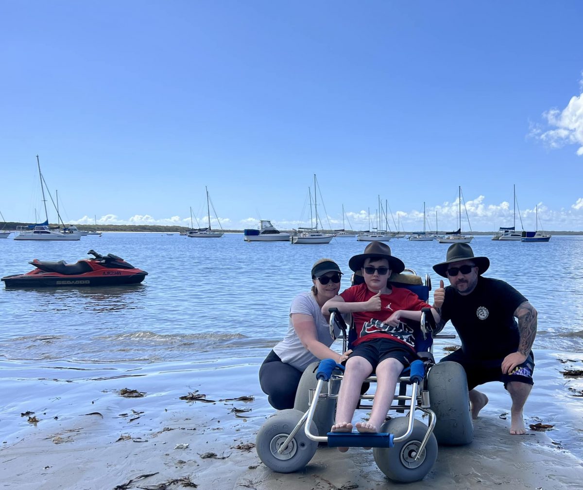 family by the water