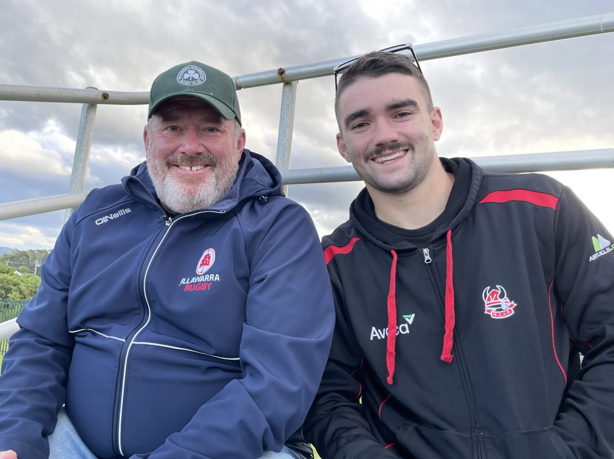 Two men watching Shamrocks v Shoalhaven game.