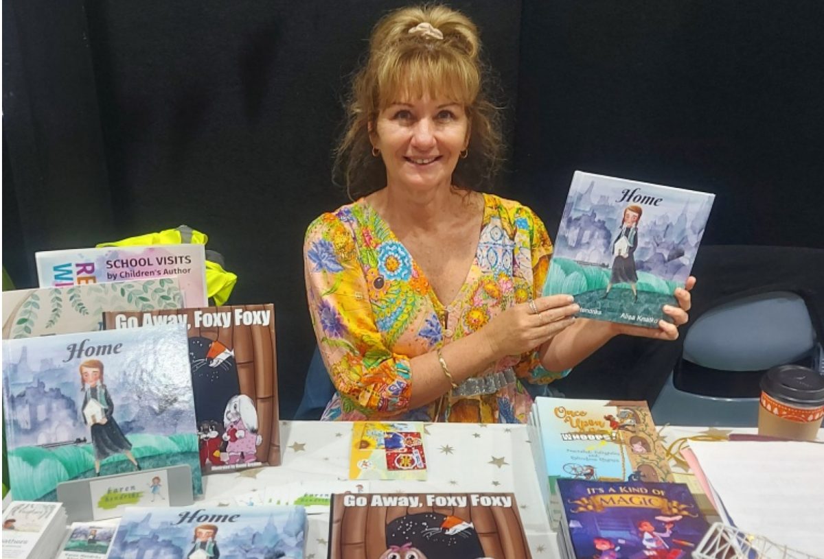 Author Karen Hendricks with her books