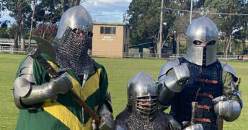 Medieval mercenaries searching for new knights to join them in battle