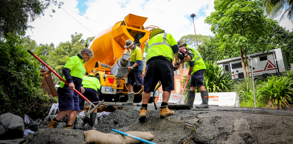 Men making road repairs