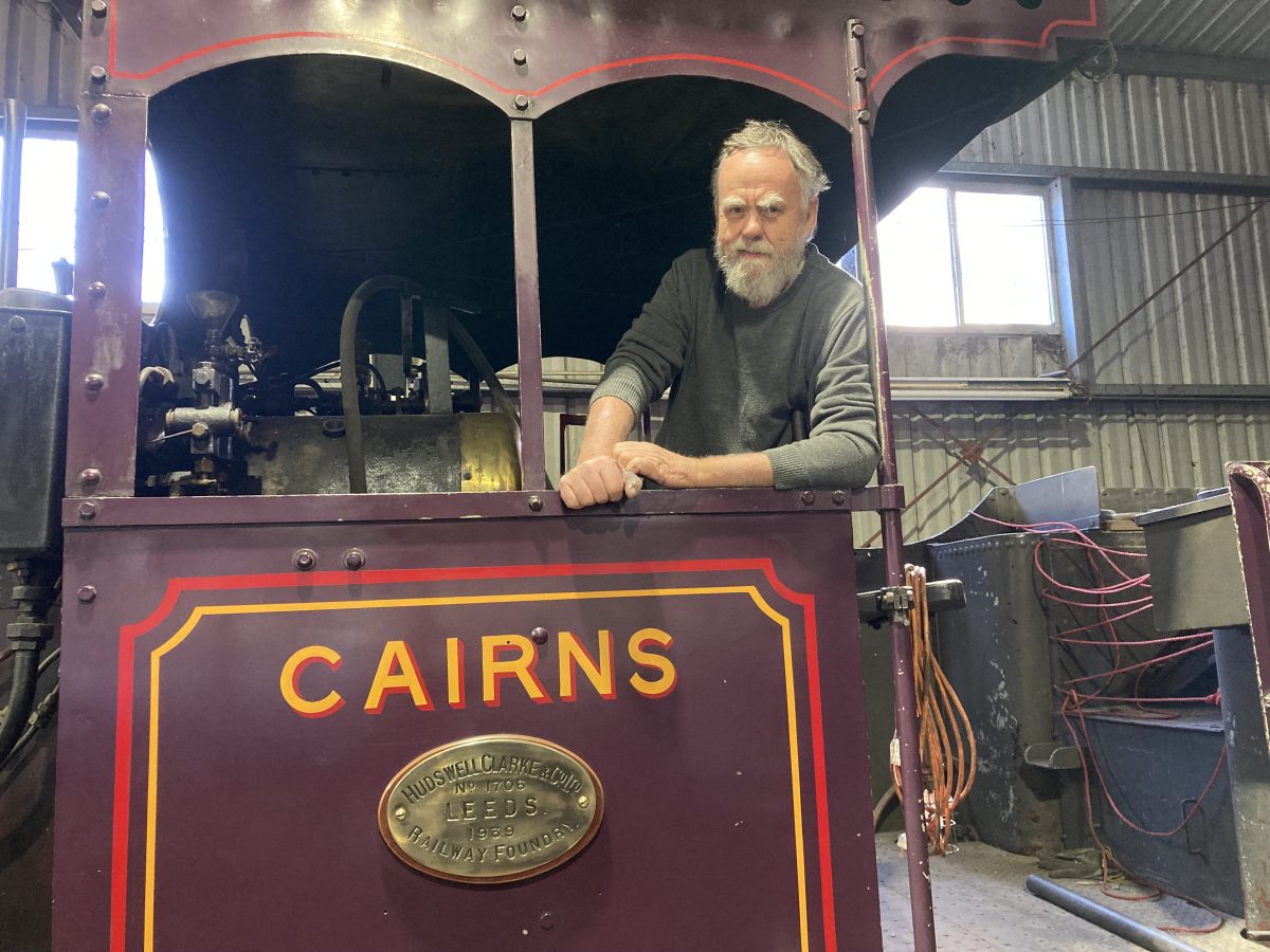 Brad Johns in locomotive Cairns at Illawarra Light Railway Museum. 