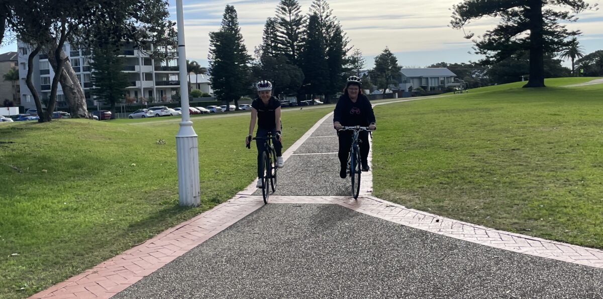 two women on bicycles