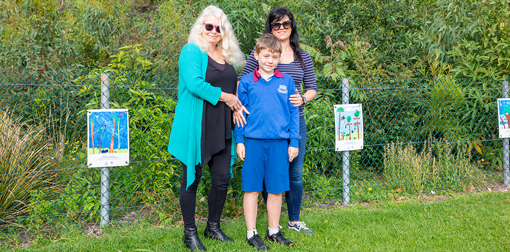 Boy with mother and grandmother.