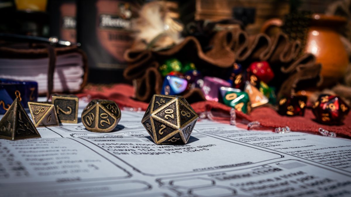 Dungeons and Dragon dice, character sheets and paraphernalia