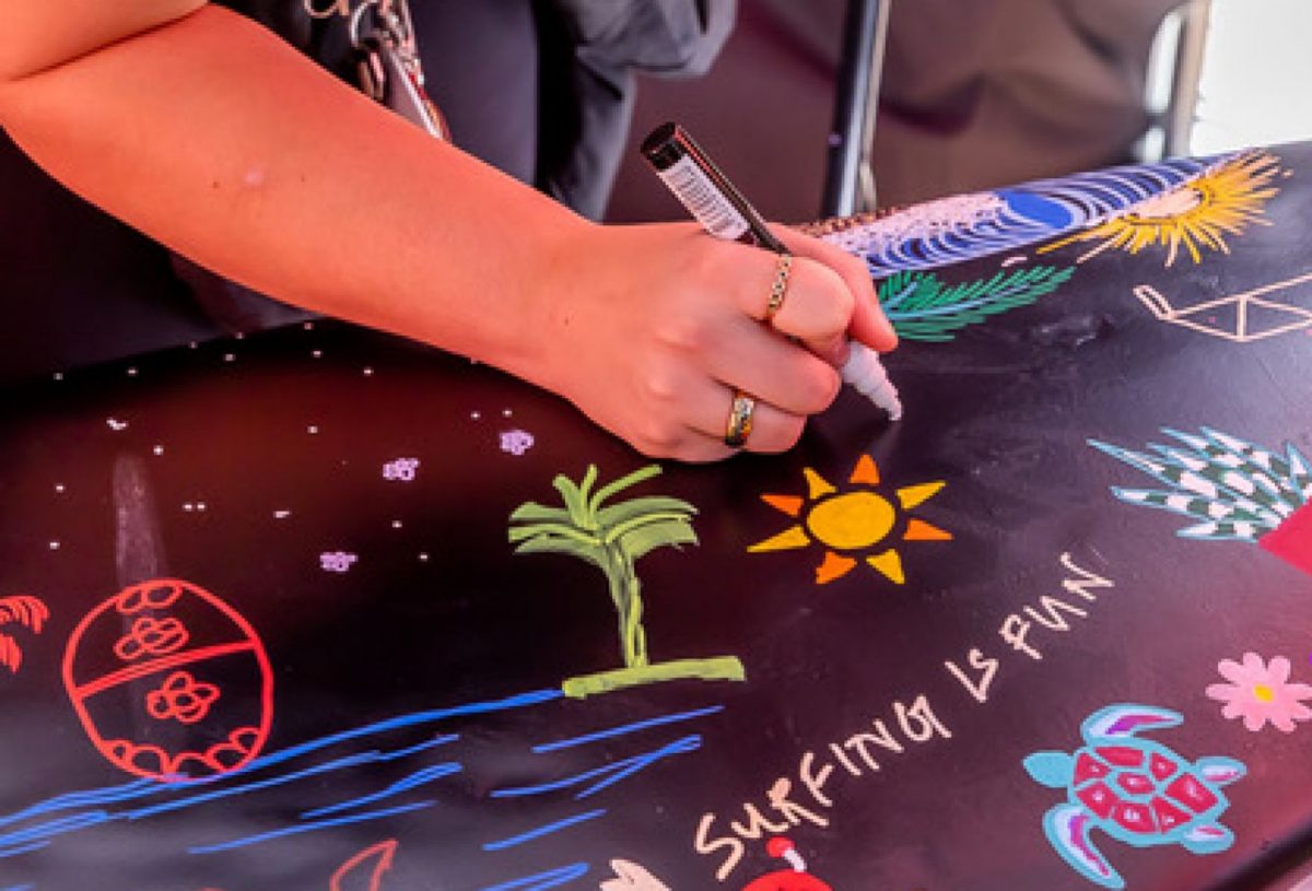 drawing on a surfboard