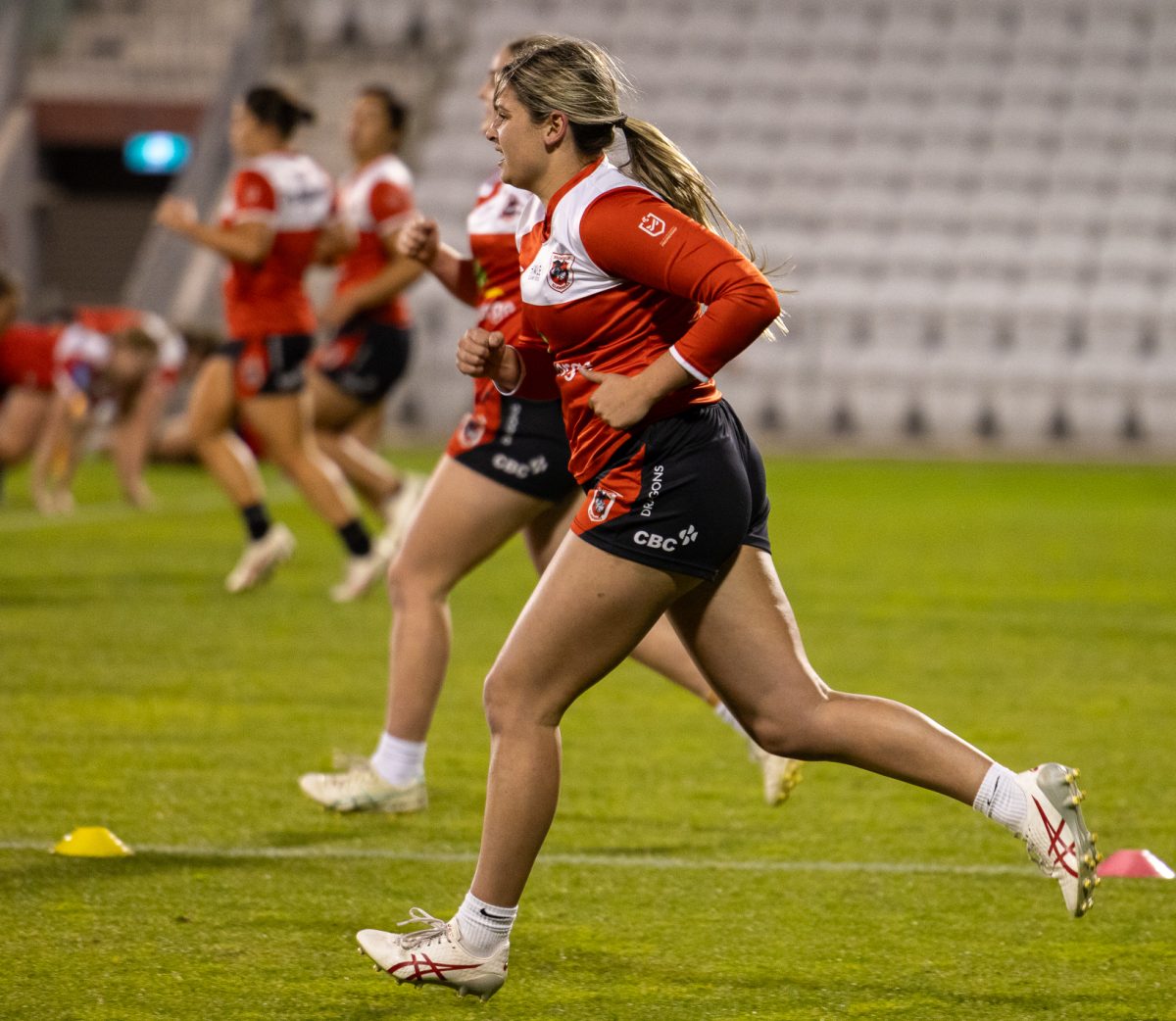 Dragons women's rugby league team at training.