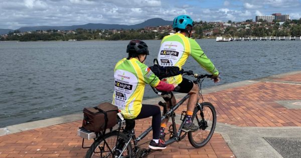 Tandem cyclists saddle up on safer tracks with new upgrades improving access for a local charity