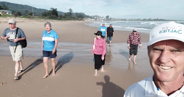 Thirroul's Silver Salties help stop isolation with weekly social strolls by the surf