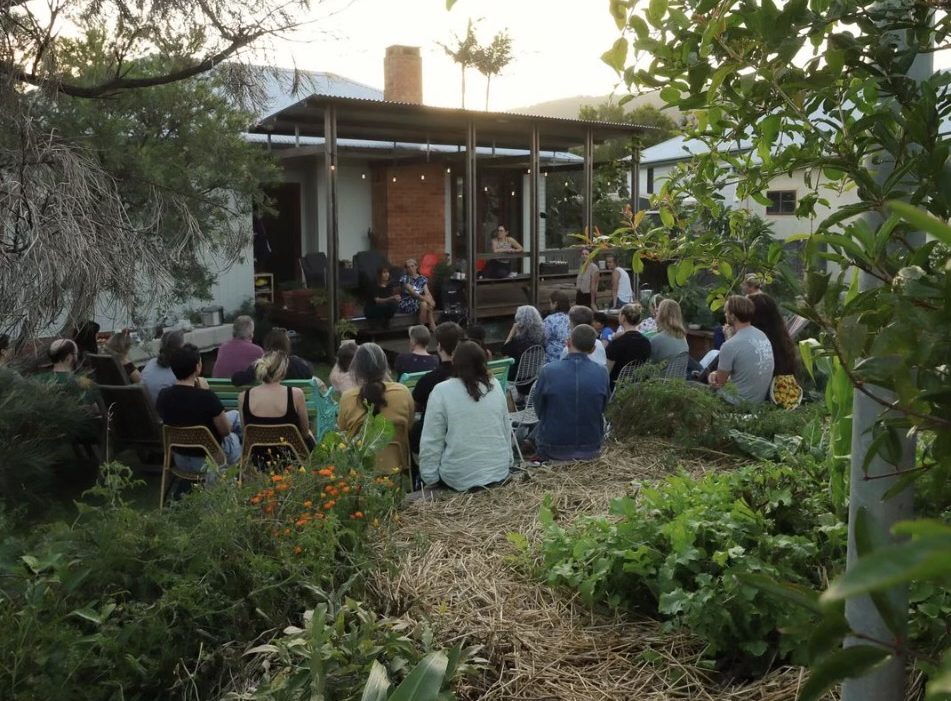 Group of people gathered in a front yard in Bulli