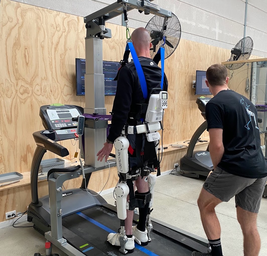 Grant Wilson uses an exoskeleton machine at Wollongong rehabilitation clinic Robofit