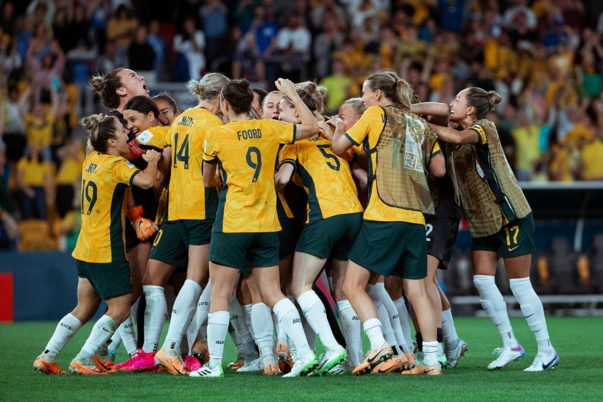The Matildas celebrate in a huddle