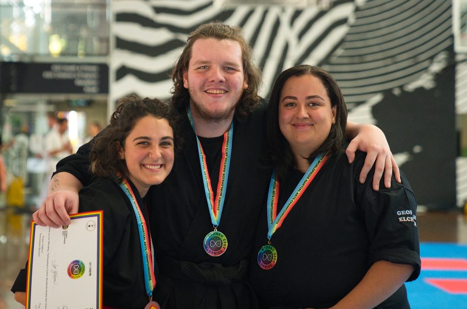 Zoe, Jye and Georgah with some of the medals they won at the Sydney World Pride Championships. 