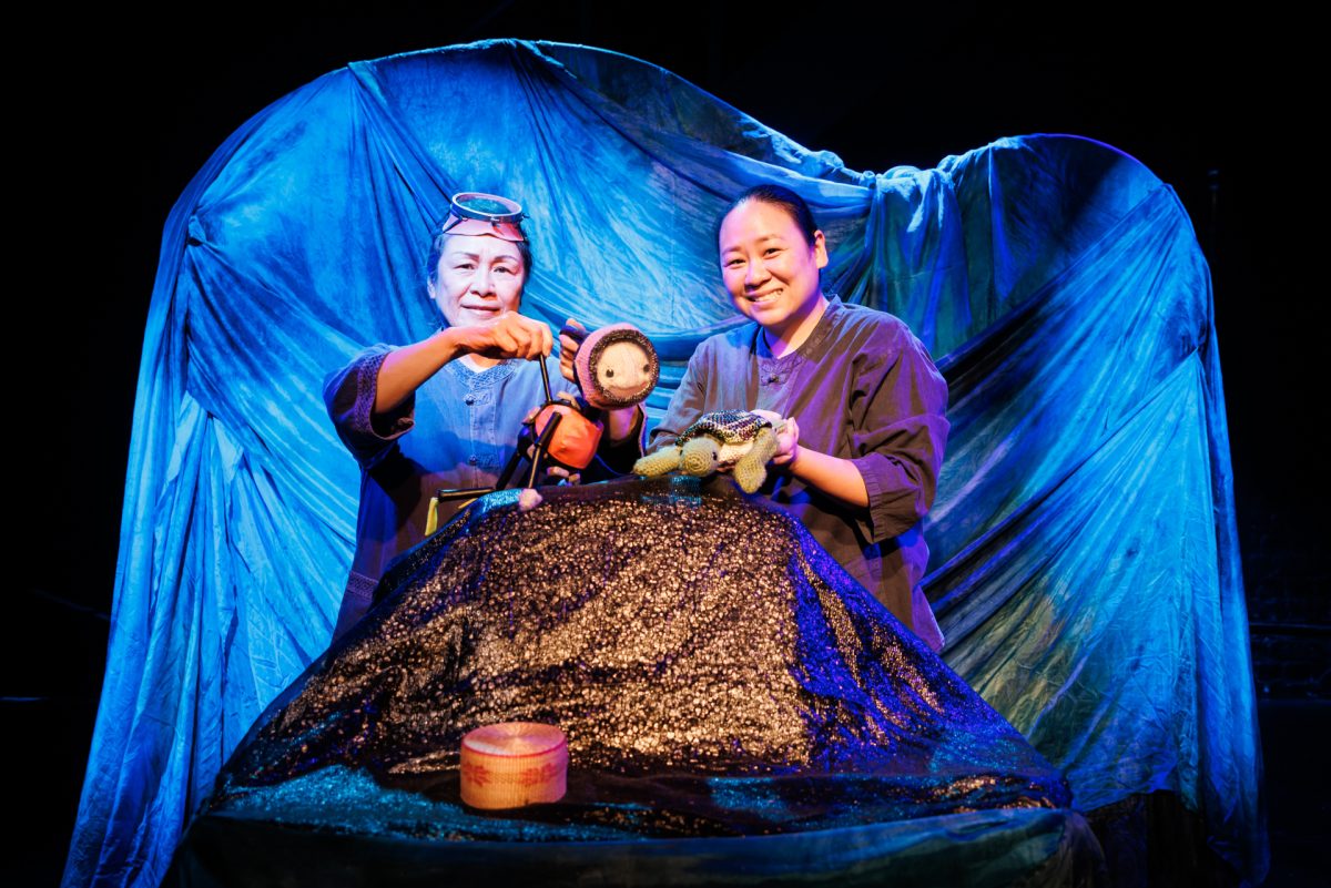 Pupperoos puppeteers Youngkyu Kwon and Kay Yasugi performing Haenyeo Women of the Sea