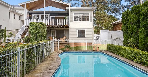 Modern elegance meets timeless charm and scenic views in this family-friendly Mangerton home