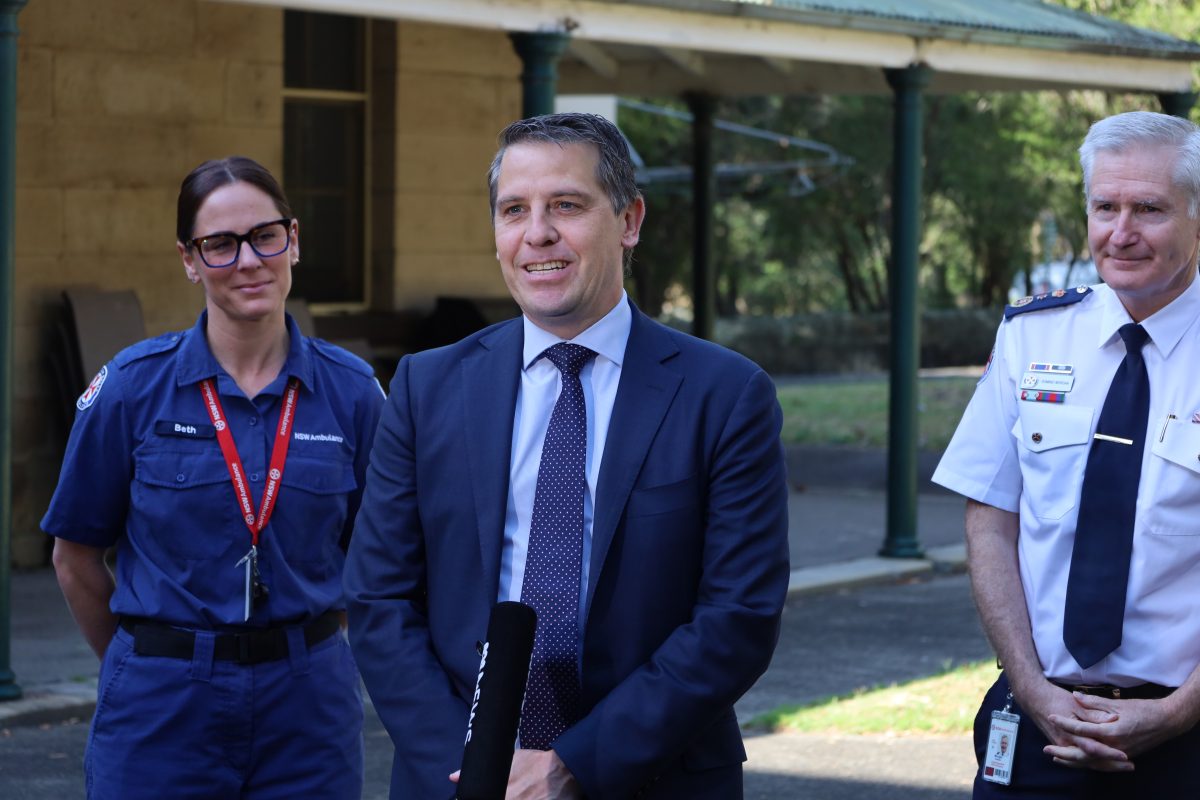 Ryan Park, Dominic Morgan and VCCC staff member Beth at a media conference.