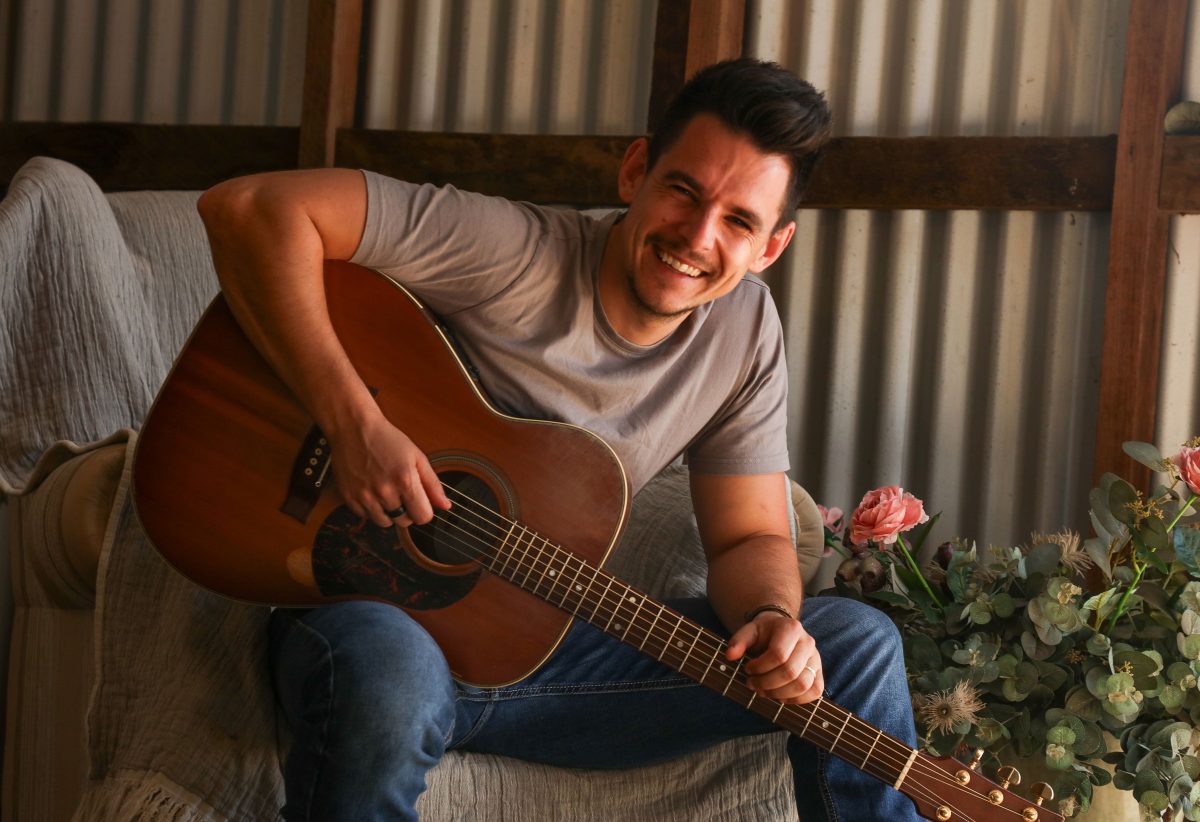 Country artist James Johnston with guitar