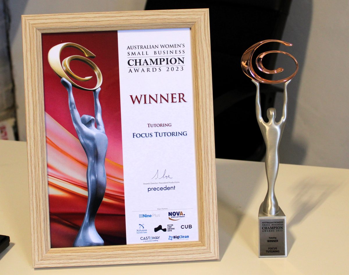 Australian Women's Small Business Champion Awards Focus Tutoring trophy and certificate.
