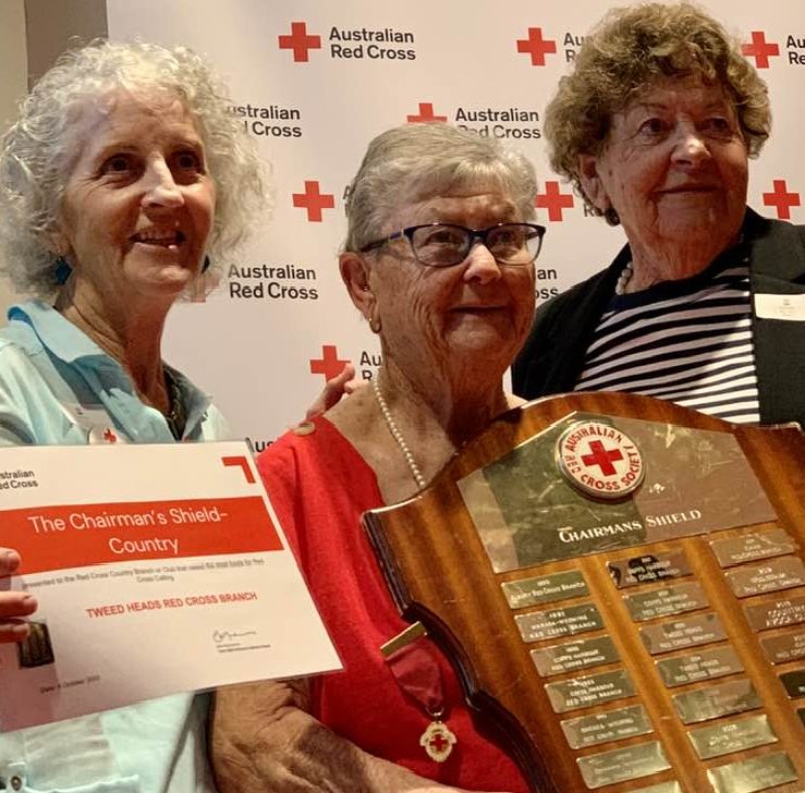 Three women honoured with a shield