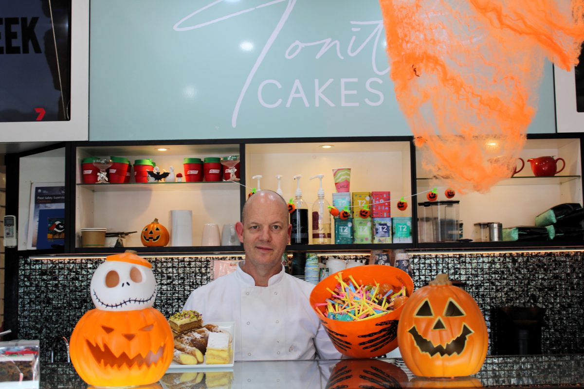 Tonitto Cakes owner Wayne Henderson with halloween candy and cakes. 