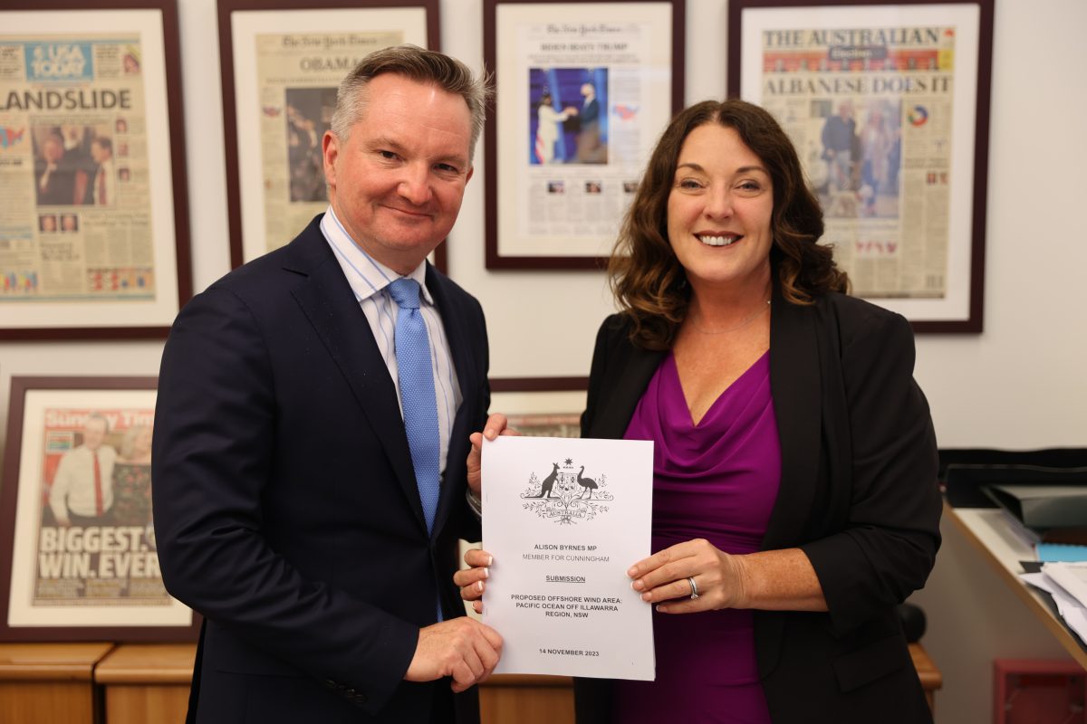 Alison Byrnes delivers her energy zone submission to Chris Bowen. 