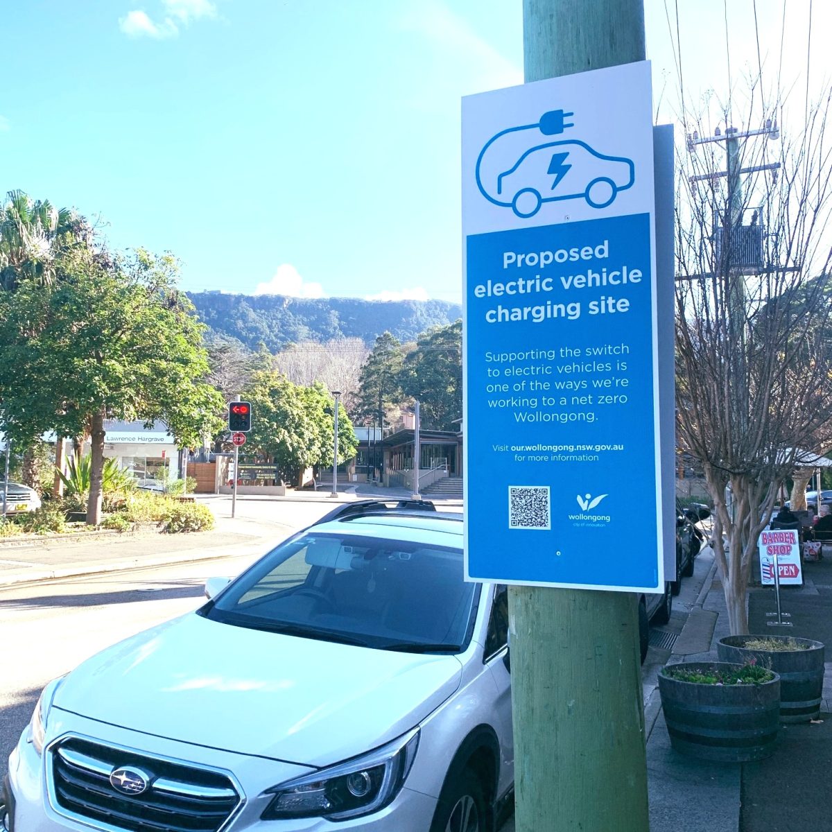 A street sign about a proposed EV charging station in Thirroul.