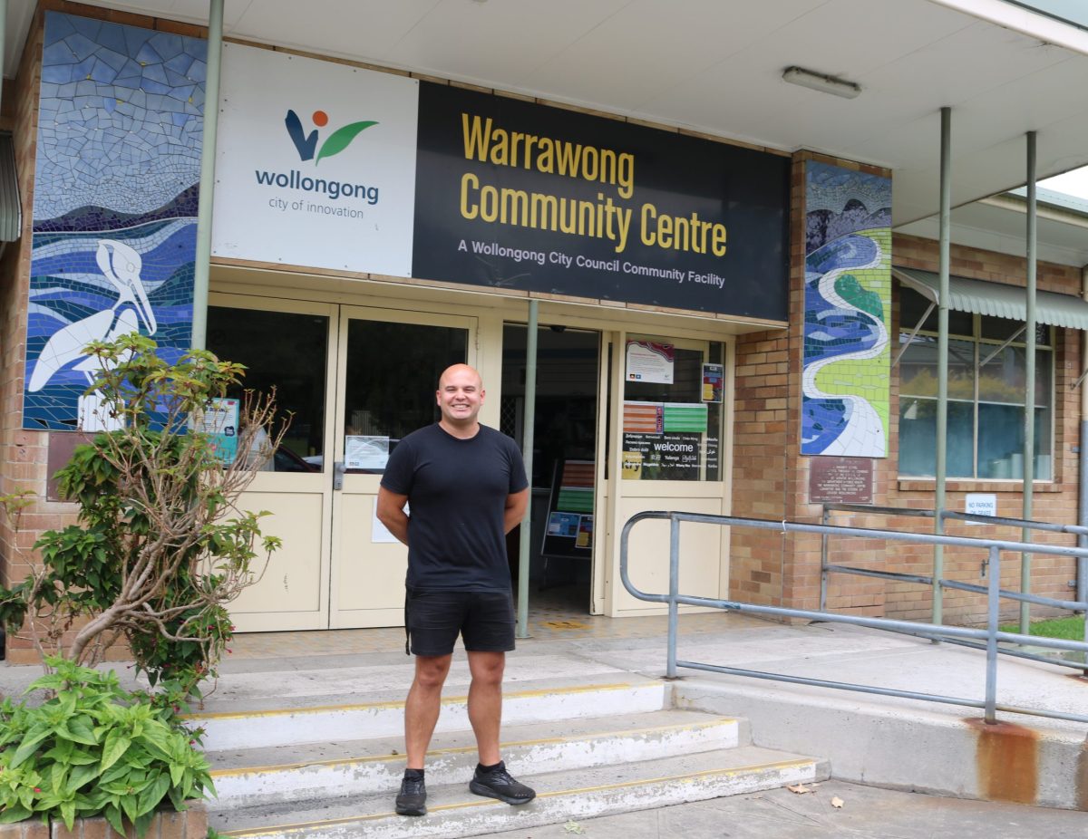 Ash Castro standing in front of Warrawong Community Centre.