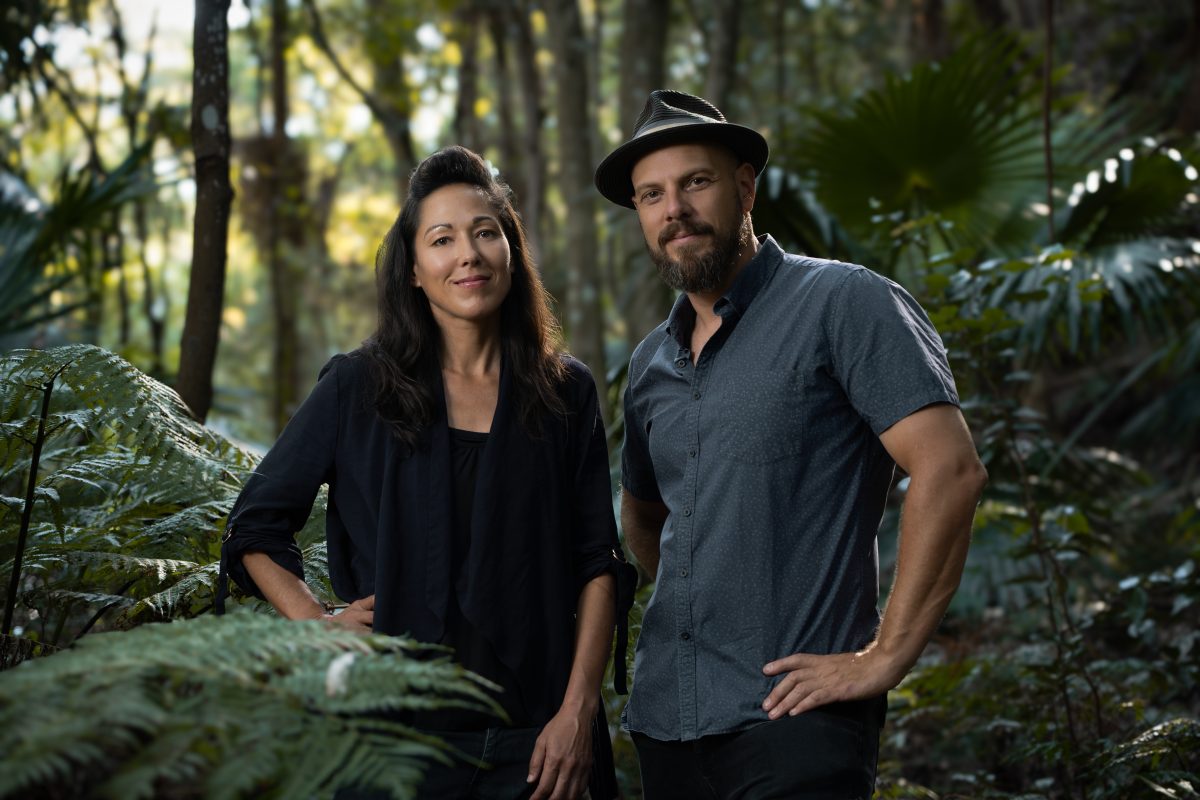 Thirroul filmmakers Kirsty B. Carter and Joe Harrison from Painting in Pictures stand in a rainforest