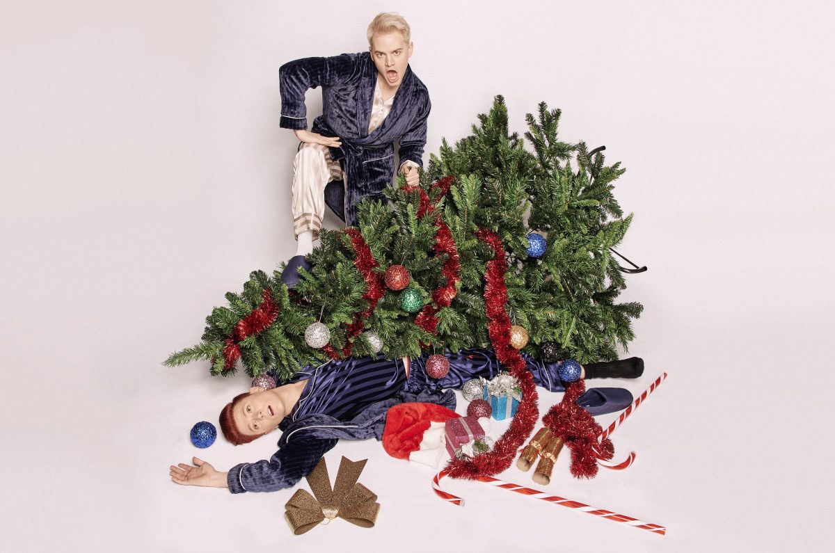 Rhys Nicholson and Joel Creasey with a toppled Christmas tree