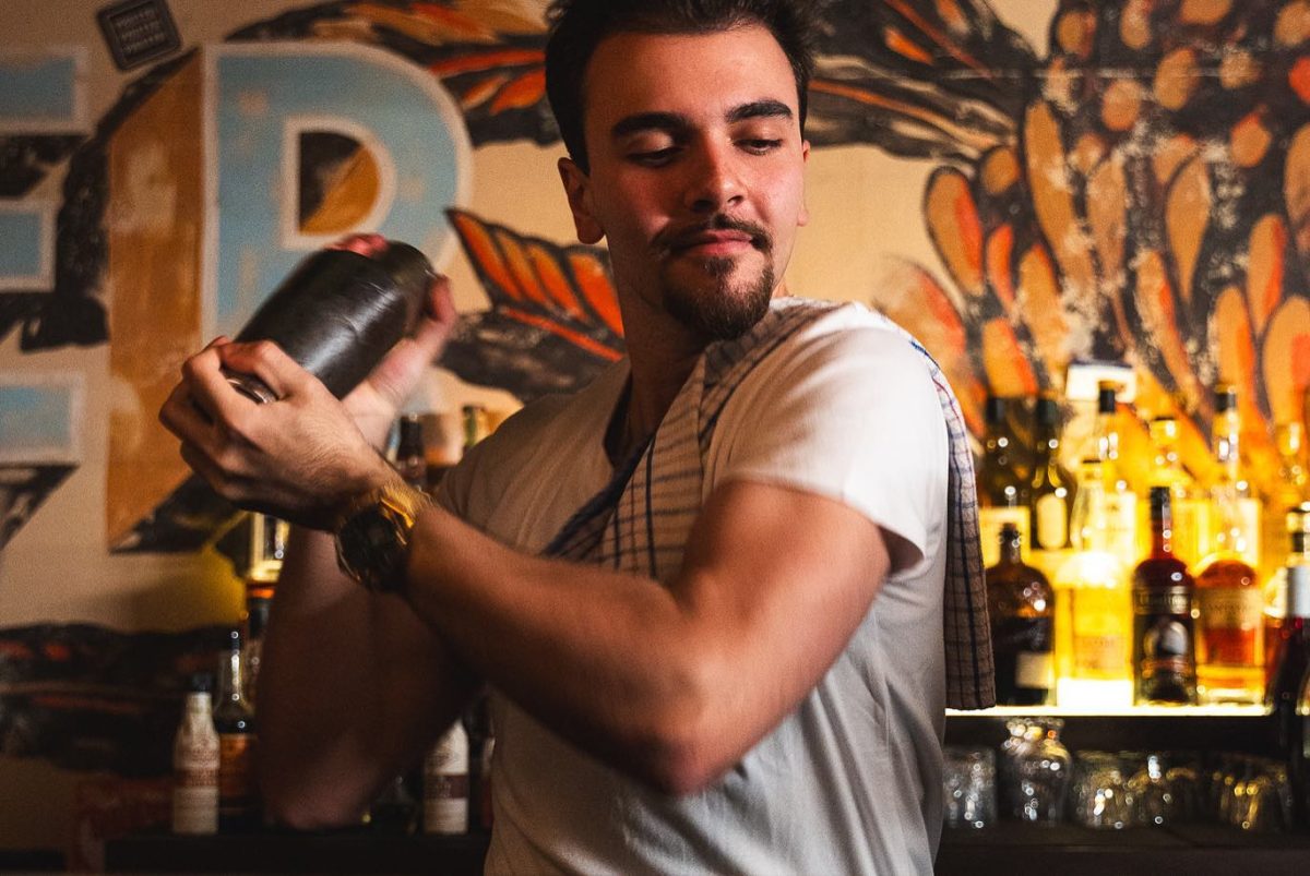 Bartender shaking a cocktail.