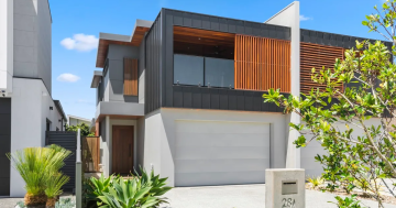 Impressive executive townhouse a stroll from Shell Cove marina