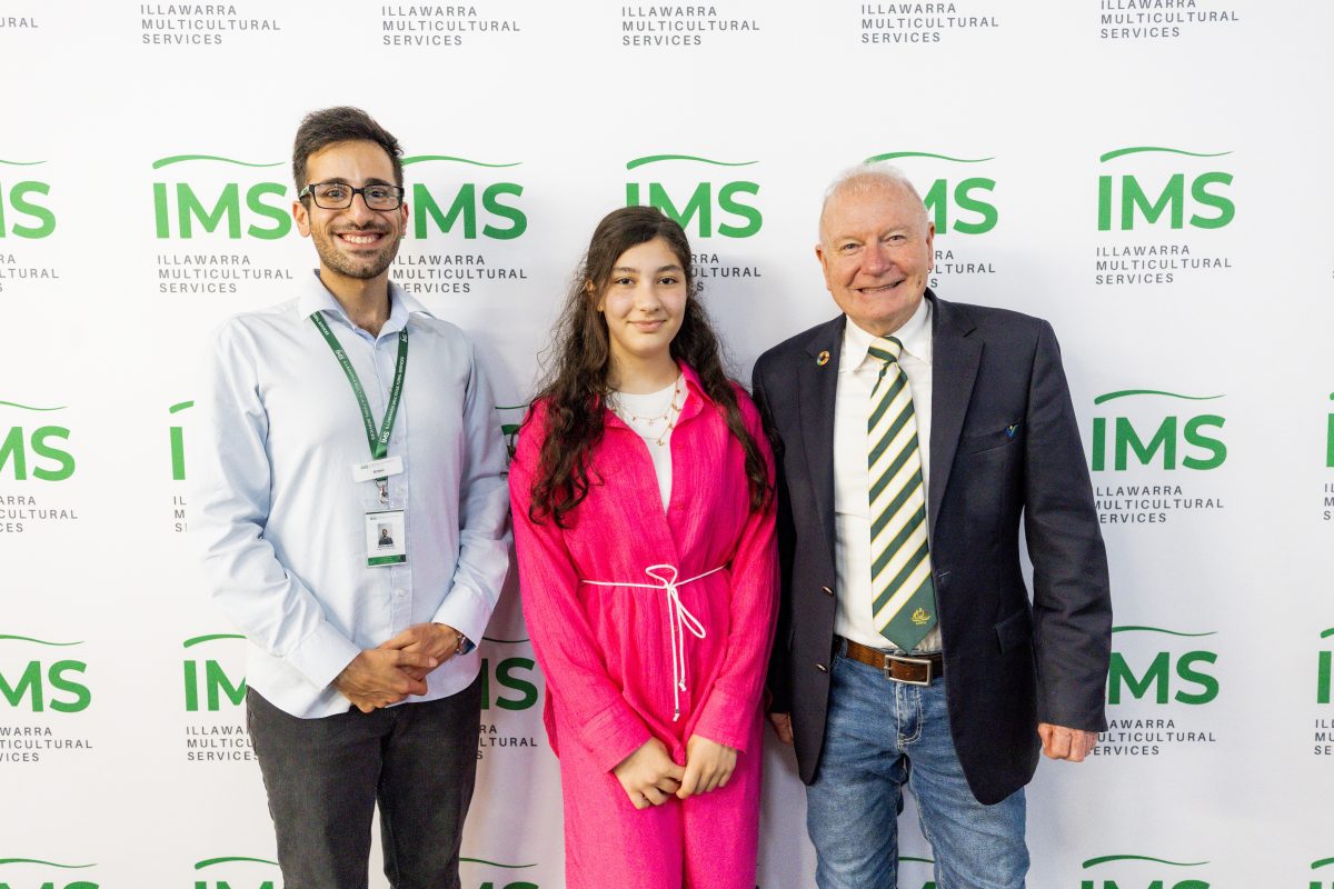 Illawarra Multicultural Society projects coordinator Amro Zoabe, Women's Writing and Art Competition 2023 award winner Shahed Al Jasry and Lord Mayor Gordon Bradbery at the award's ceremony