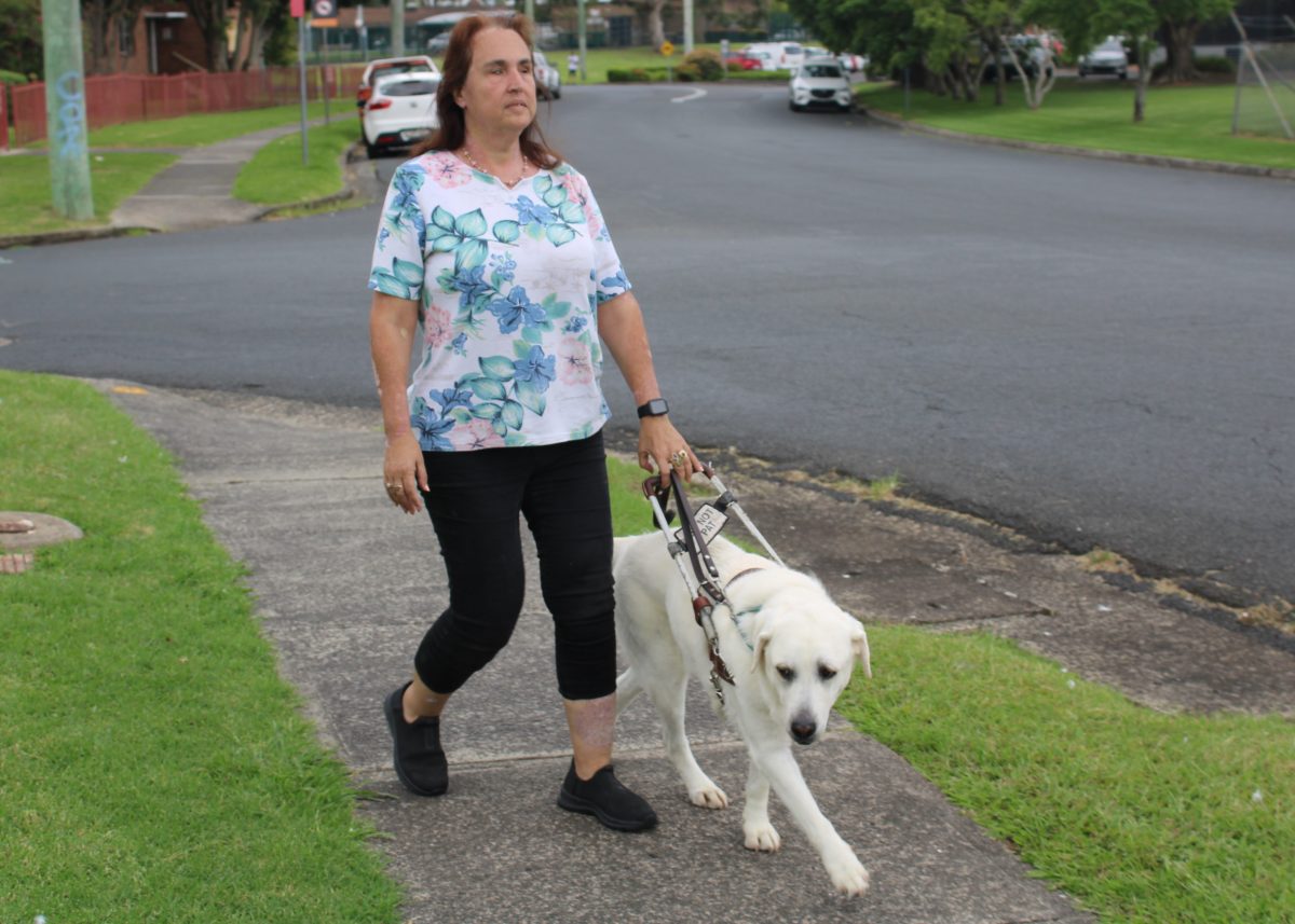 Maria Chapman and her guide dog.