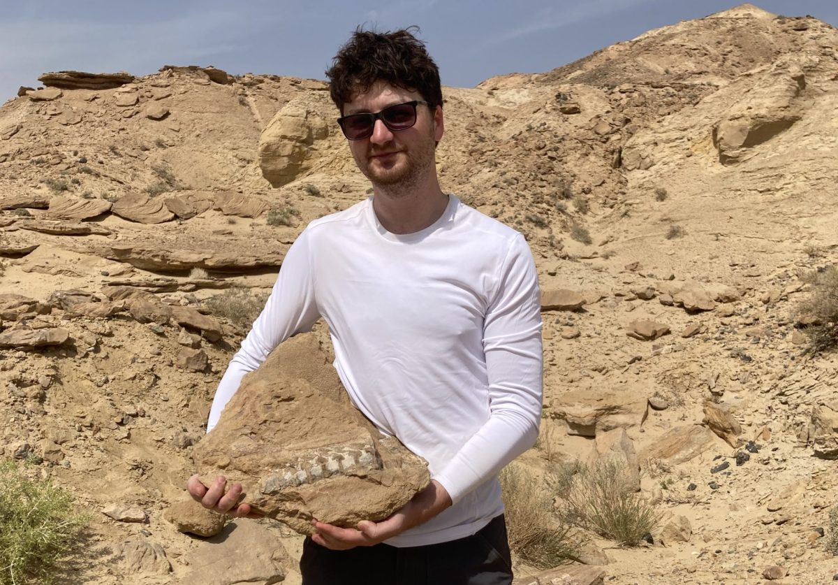 Nathan with dinosaur bone. 