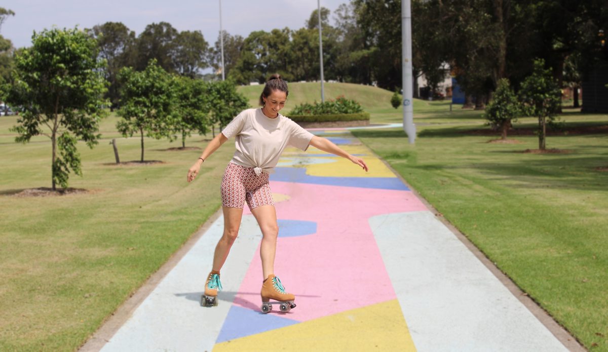 Tracey skating on path