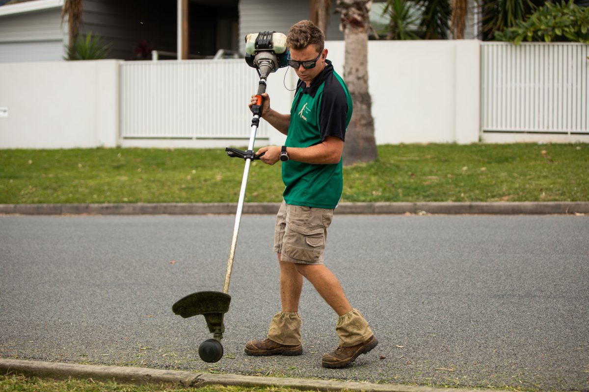 Man using whipper snipper