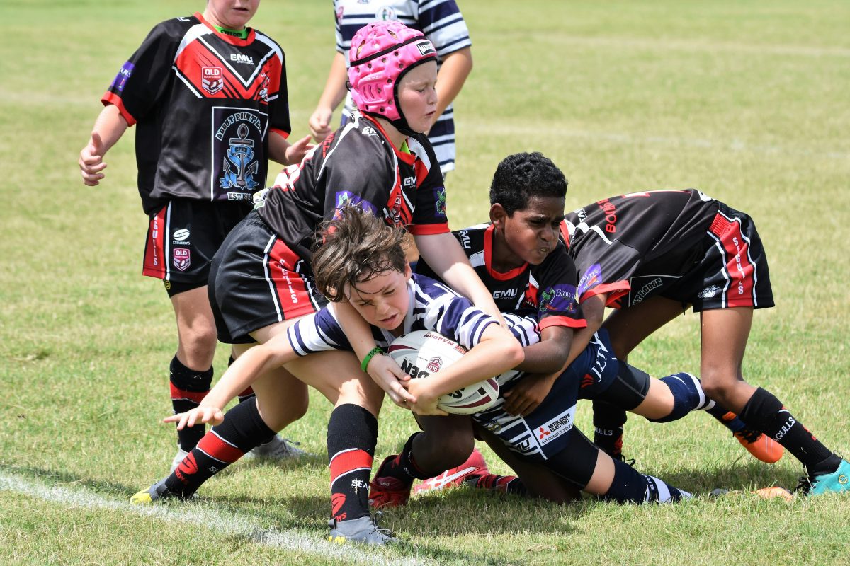 Kids playing rugby