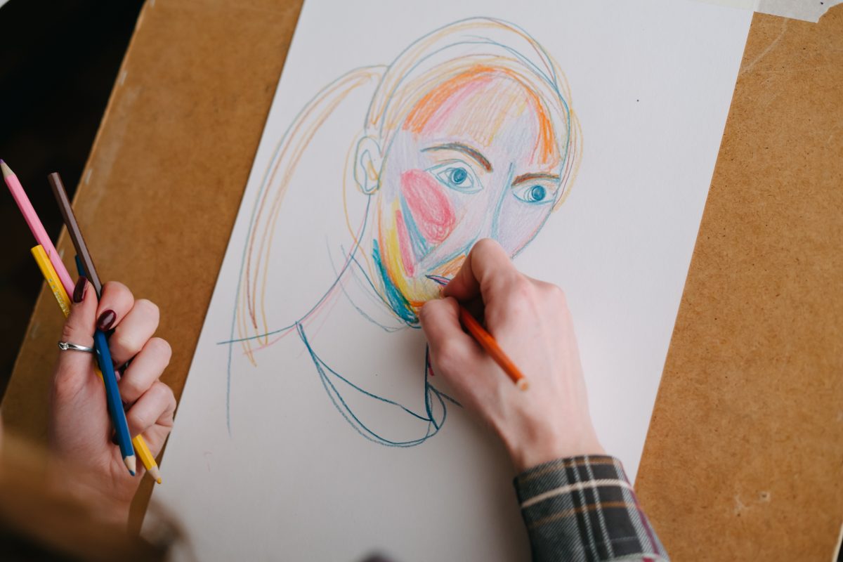 Hand sketch of a self-portrait in colours