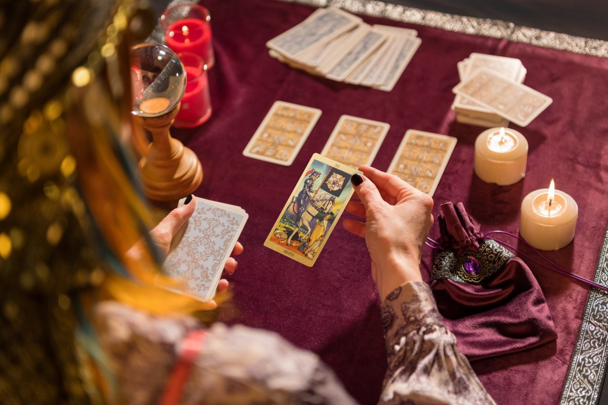 Woman with tarot cards predicting future