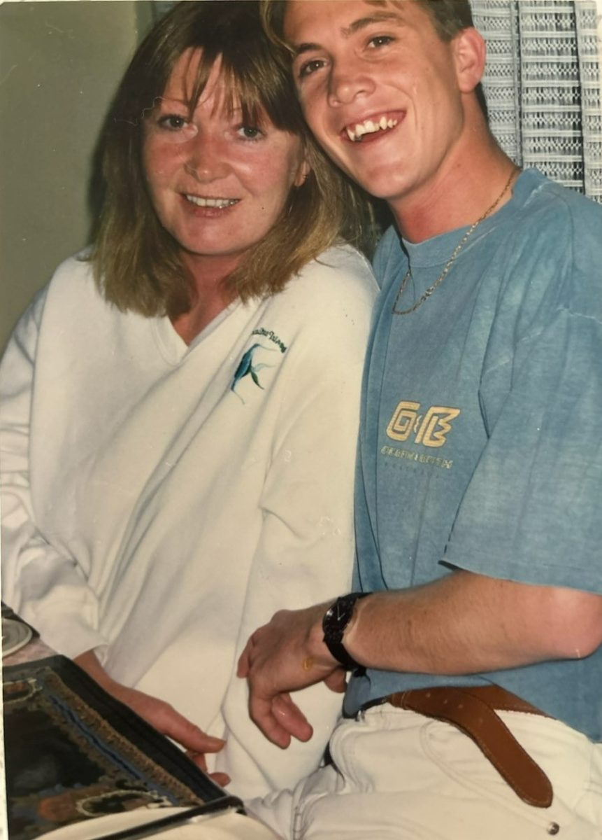 woman and young man sitting together