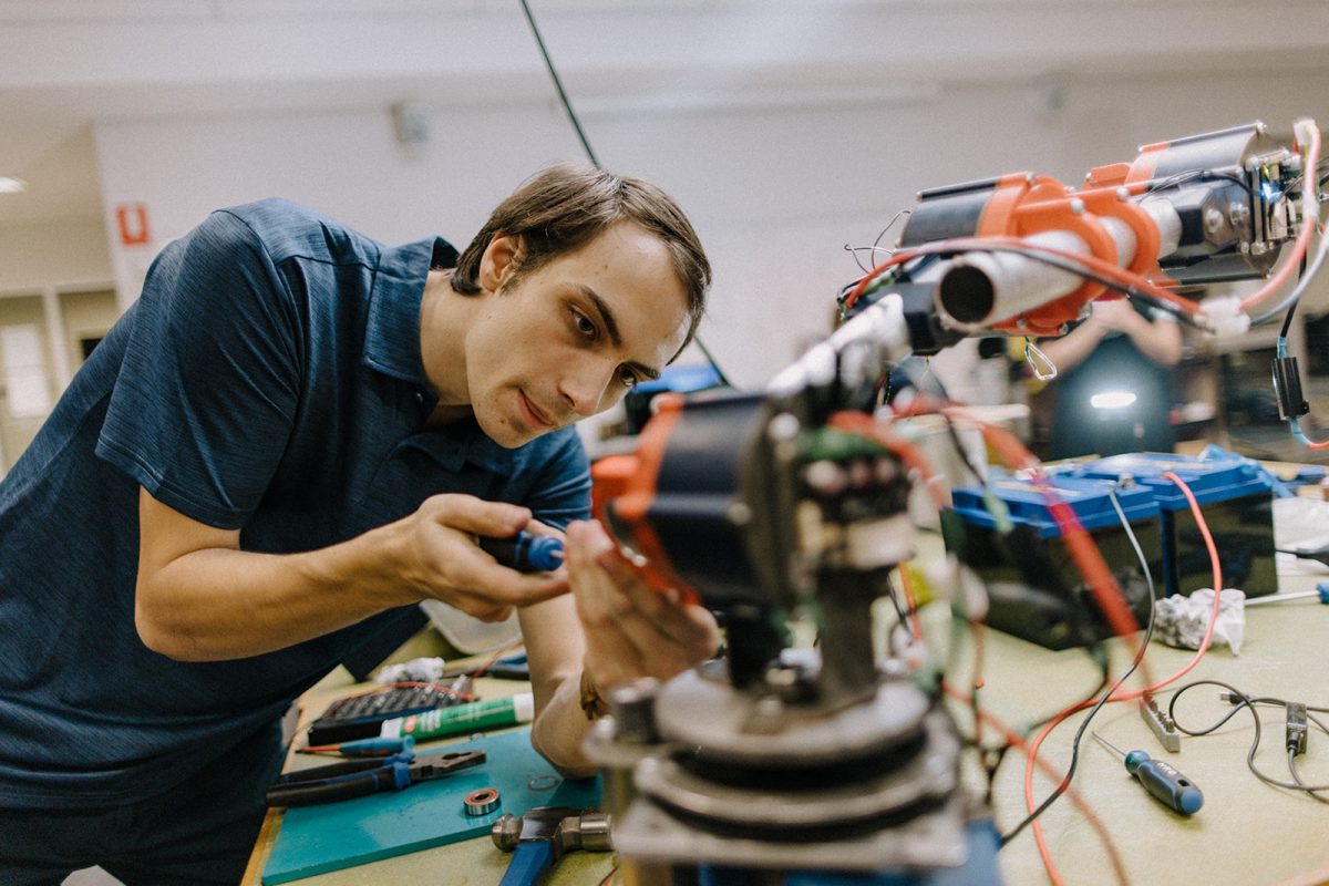 Student working on a robot.