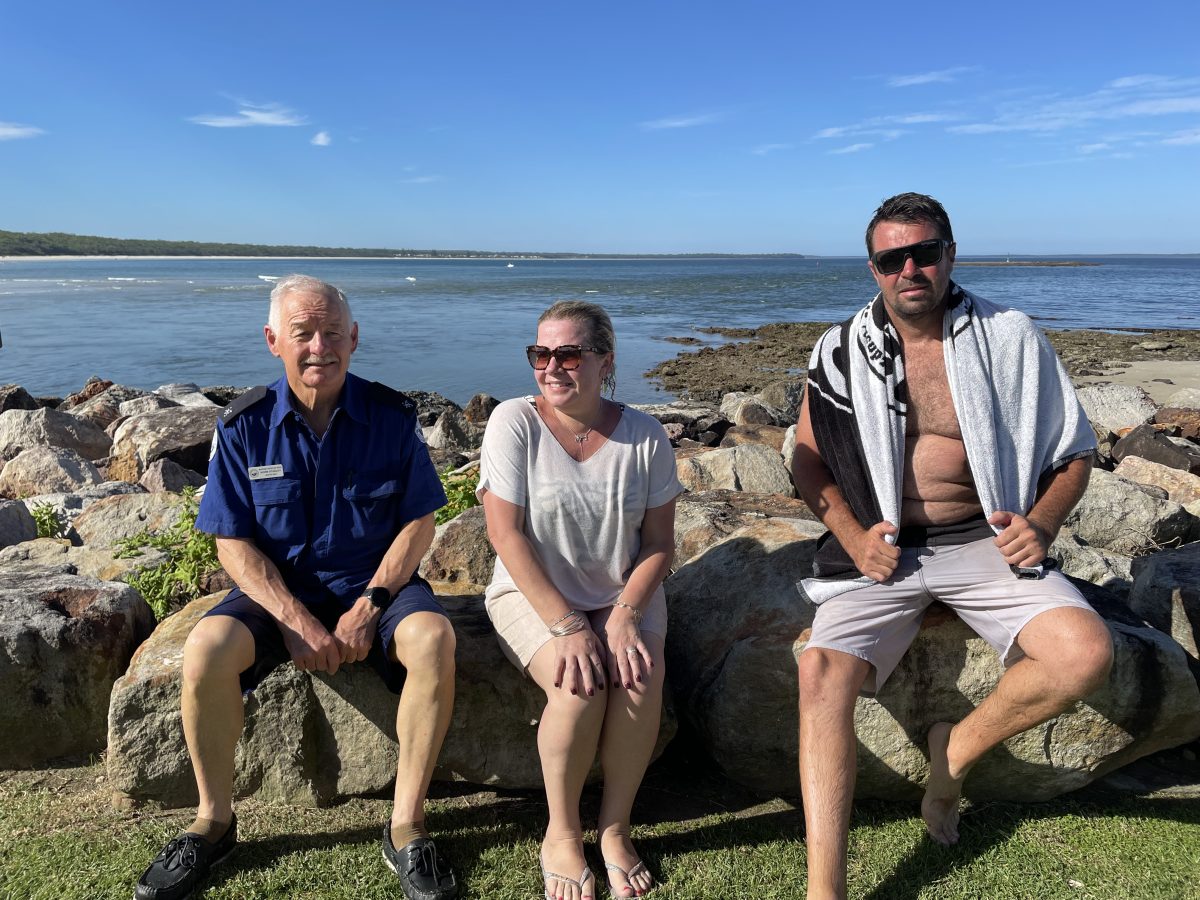 Marine Rescue NSW volunteer Norm Stanley (left) along with a member of the public (right) saved a British tourist (centre) from a rip at Huskisson on Tuesday 12 March.