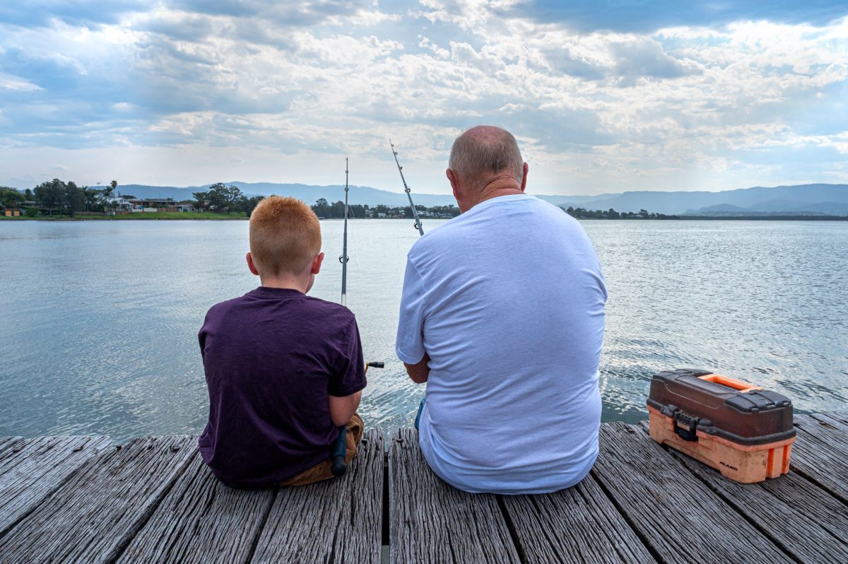 Man and boy fishing.