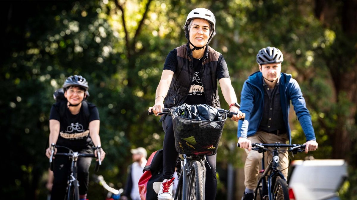 Juliana Peloche (centre) will be part of a "bike bus" and screening of the film Women Don't Cycle on Saturday.