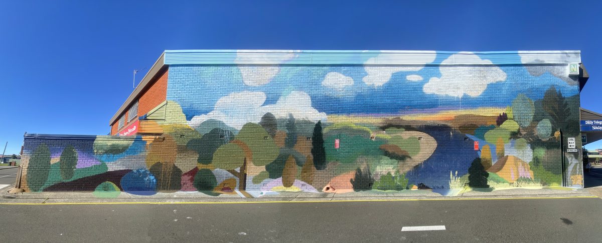 Mural showing a landscape.