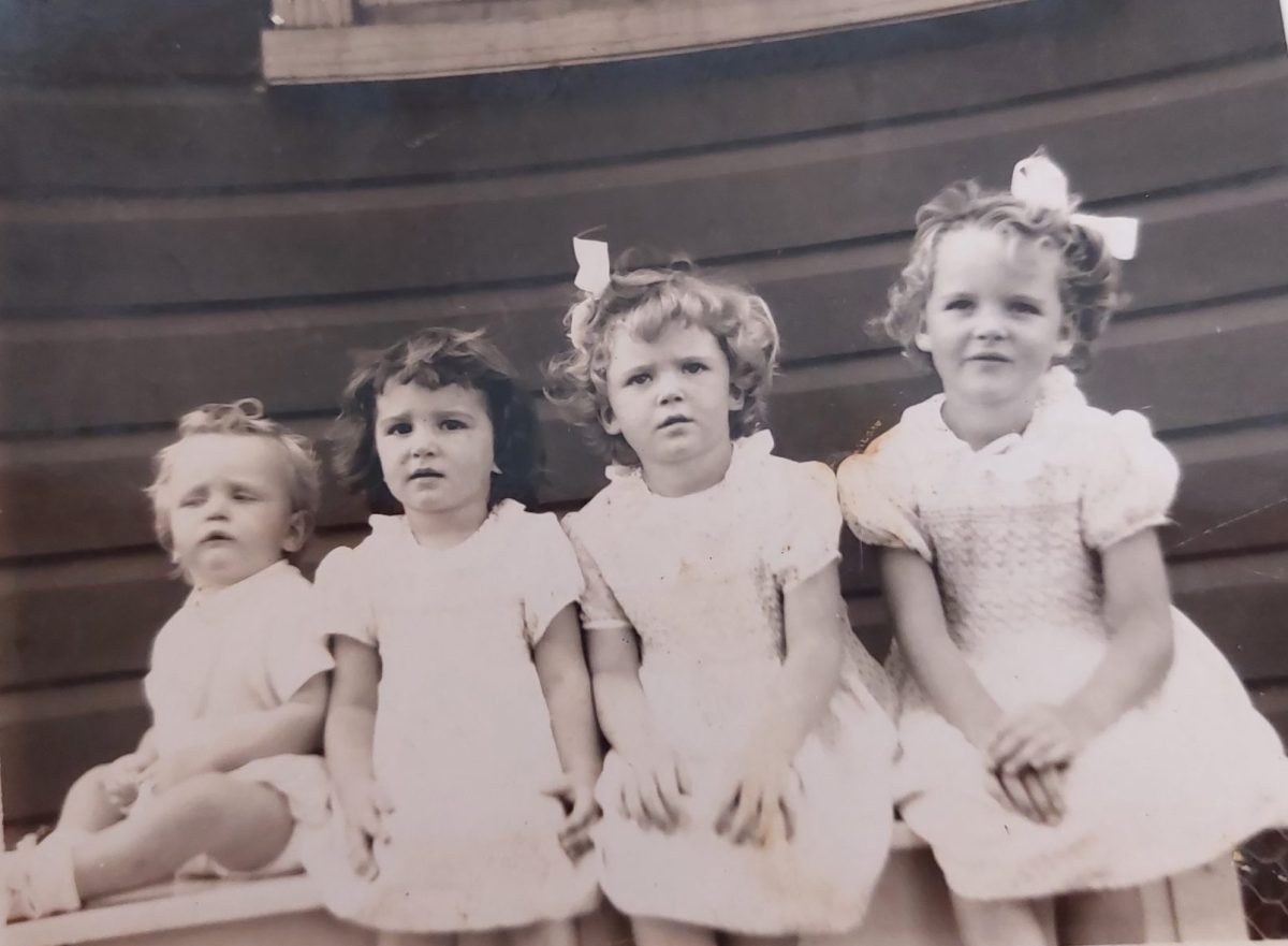 Old photo of four little girls.