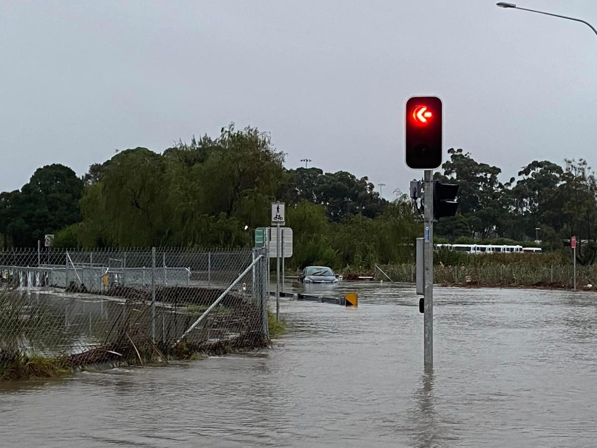 Car stuck in flood waters.