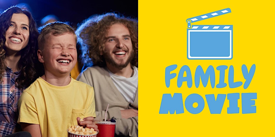 Family of three watches a movie and laughs