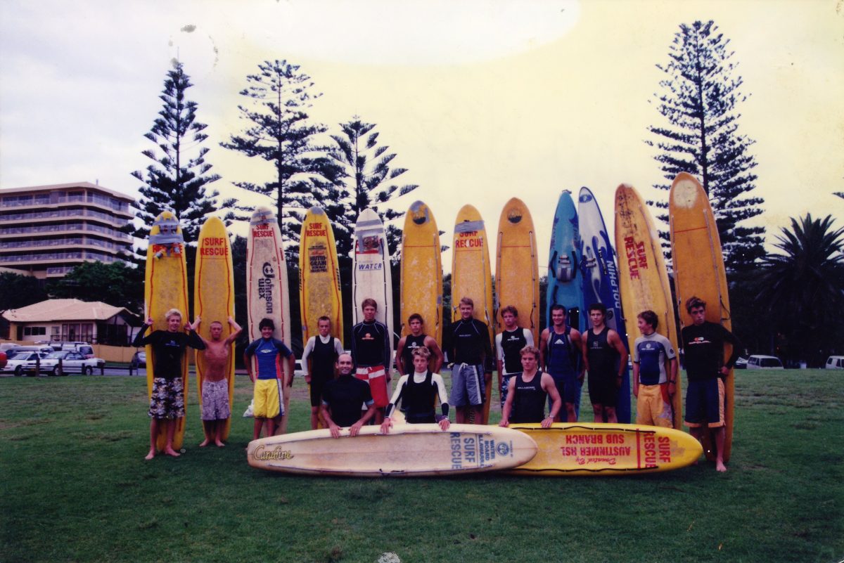 Group of people with paddleboards.